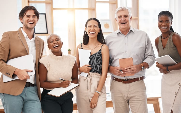 diverse office team smiling laughing together