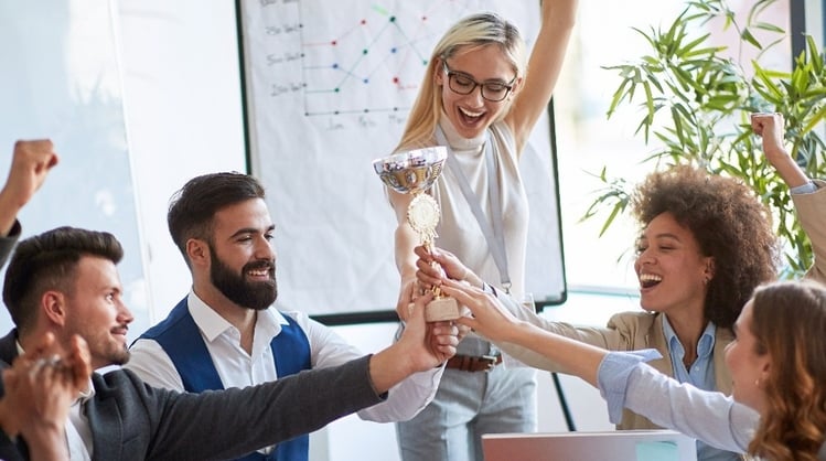 diverse-corporate-team-celebrating-together-art-conference-table crop-2